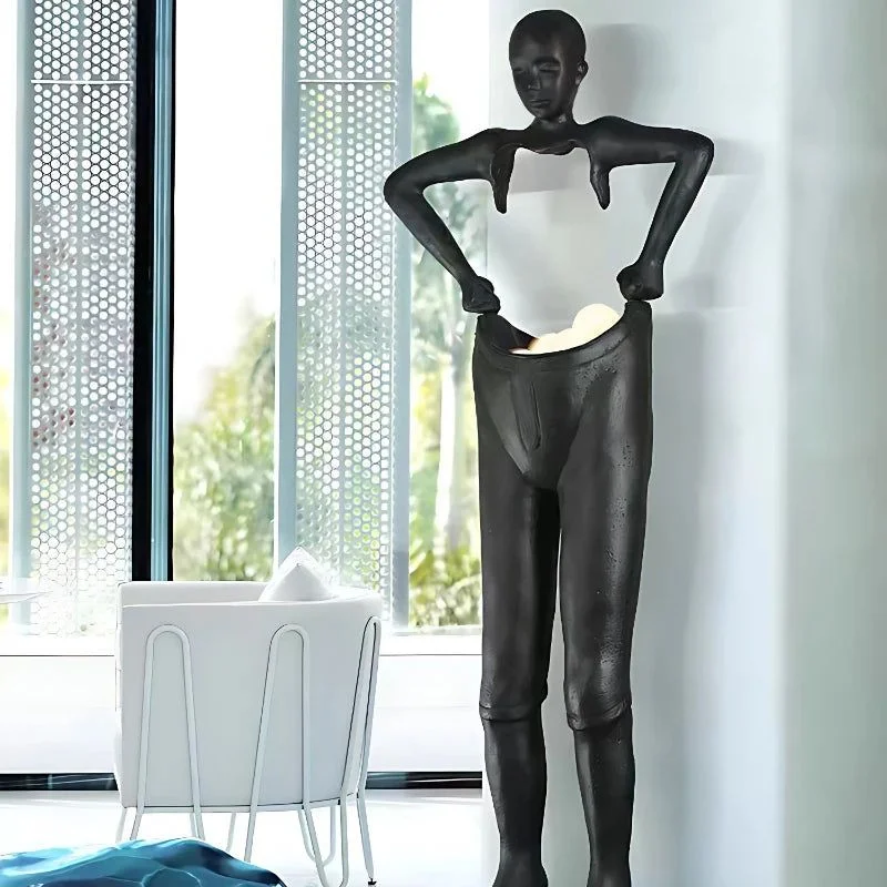 Humanoid Sculpture Holding Floor Lamp